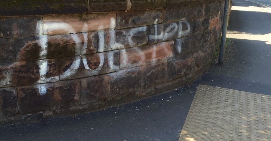 Two 17-year-olds admit their part in the graffiti trail in Ashton on Mersey and pay for some of the clean up