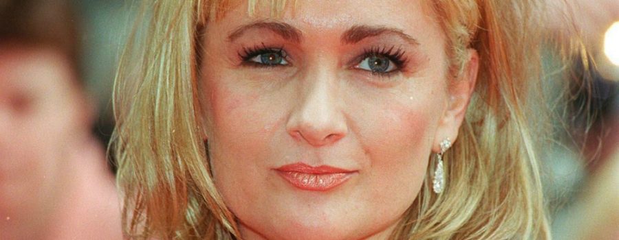 Actress and writer Caroline Aherne dies aged 52 at her home in Timperley